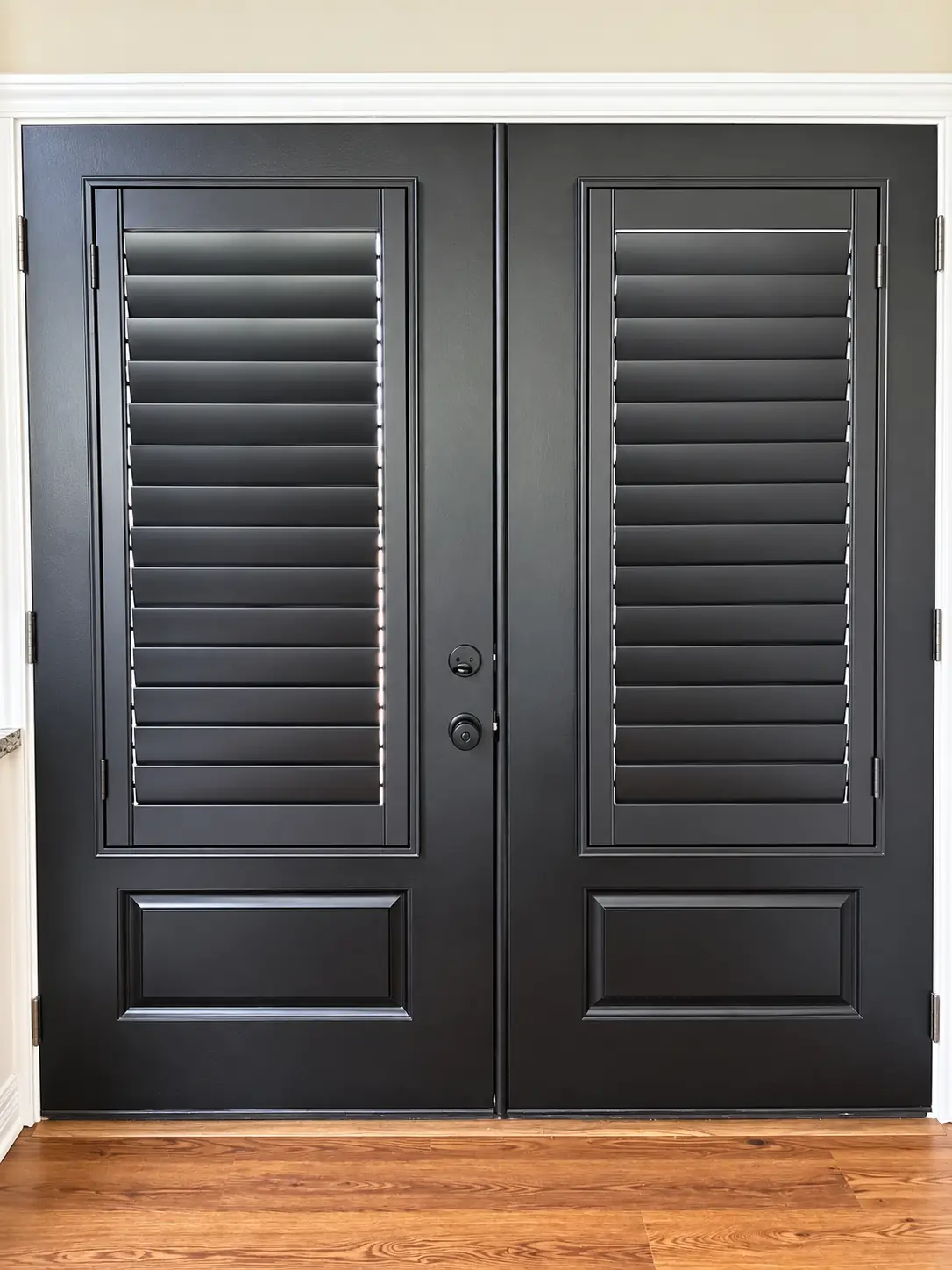 Custom black shutters fitted to double entry doors