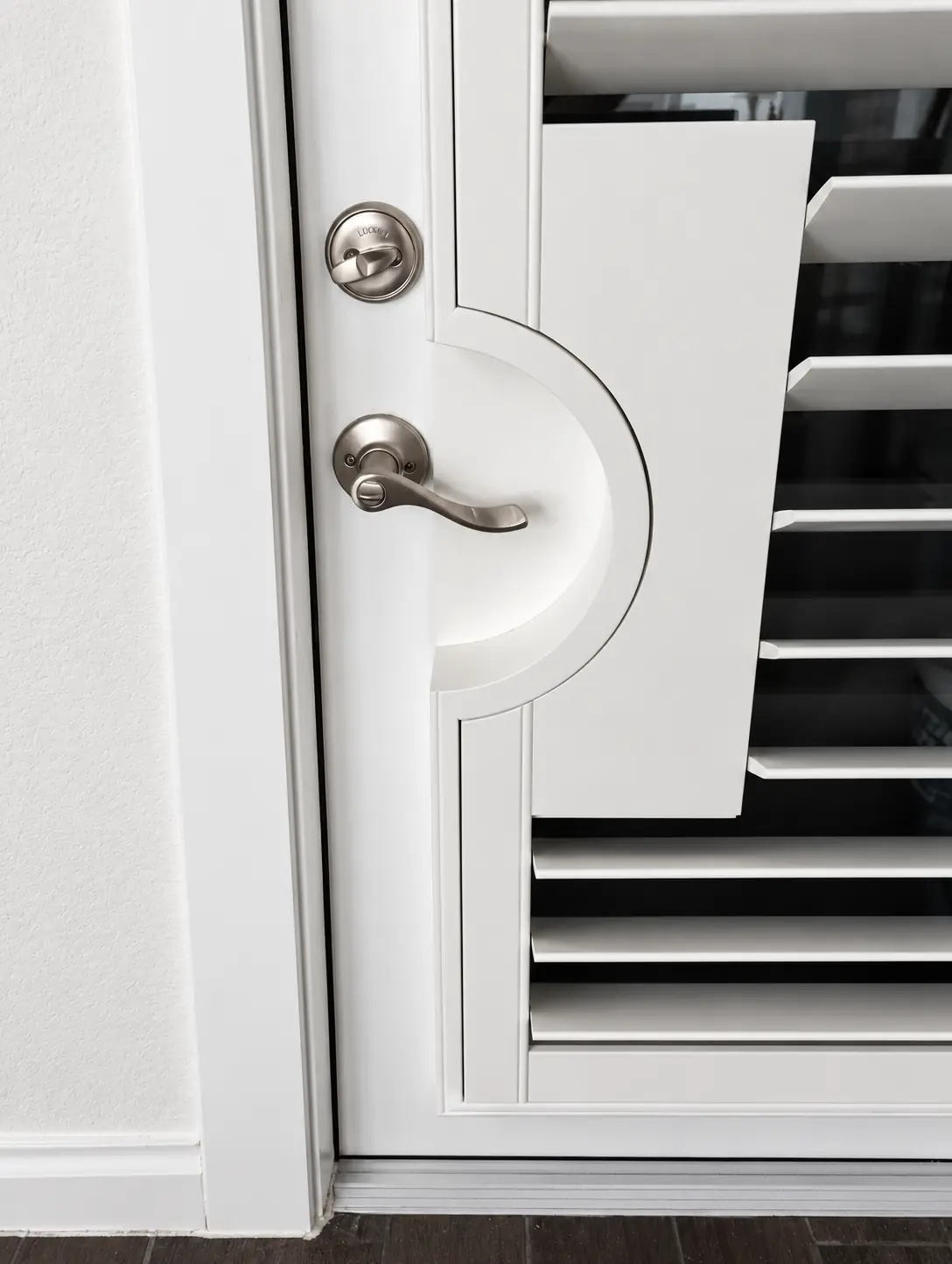 Custom shutter cutout fitted around a door handle