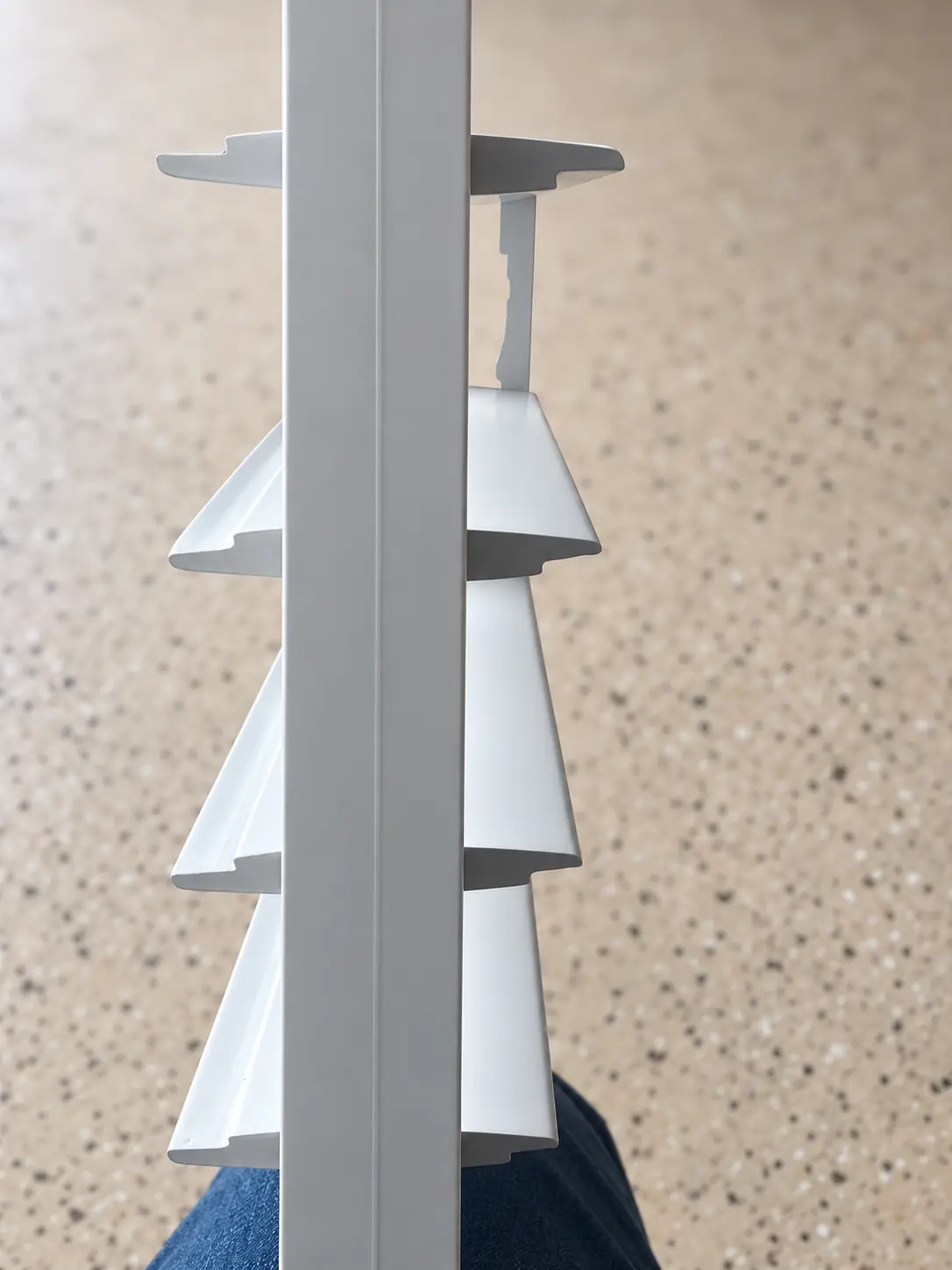Side profile showing a rear tilt mechanism on plantation shutter louvers